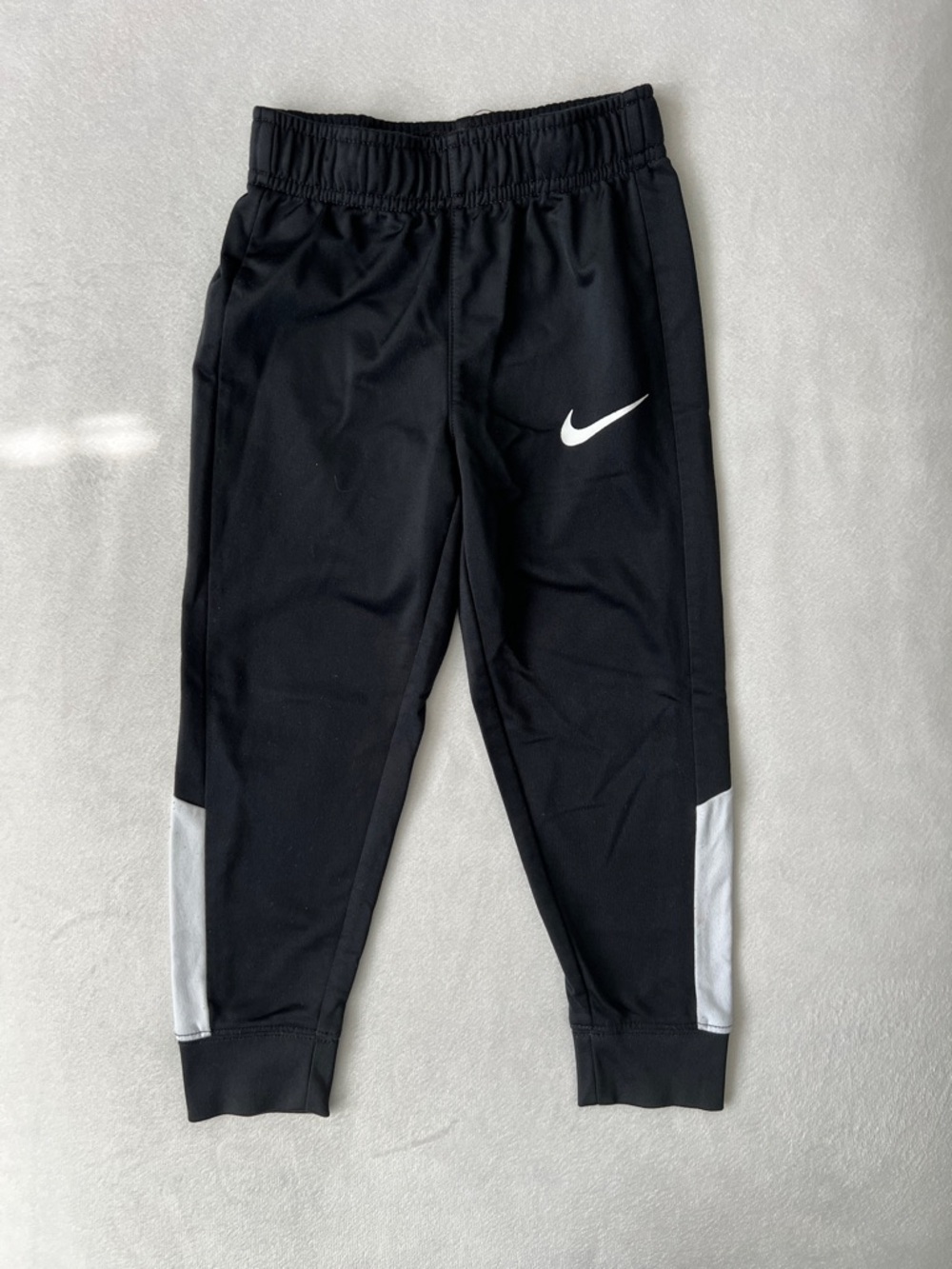 Nike Black Kids' Joggers with White Swoosh and Side Panels
